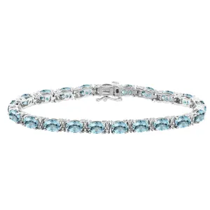 Jewelili Sterling Silver With Round Diamonds and Oval Shape Swiss Blue Topaz Bracelet