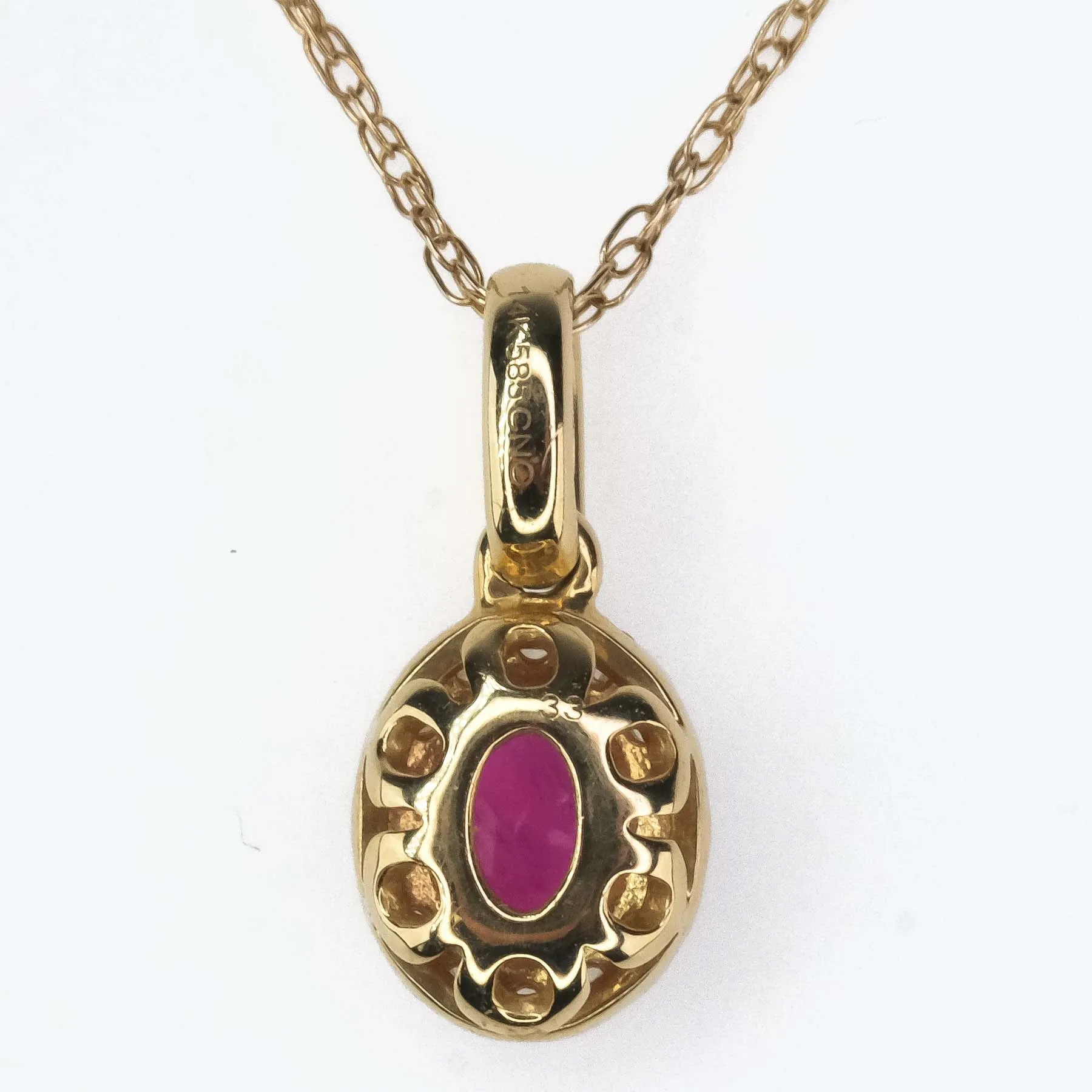 Ruby & Diamond Accented Oval Halo Pendant on 18" Chain Necklace in 10/14K Yellow Gold