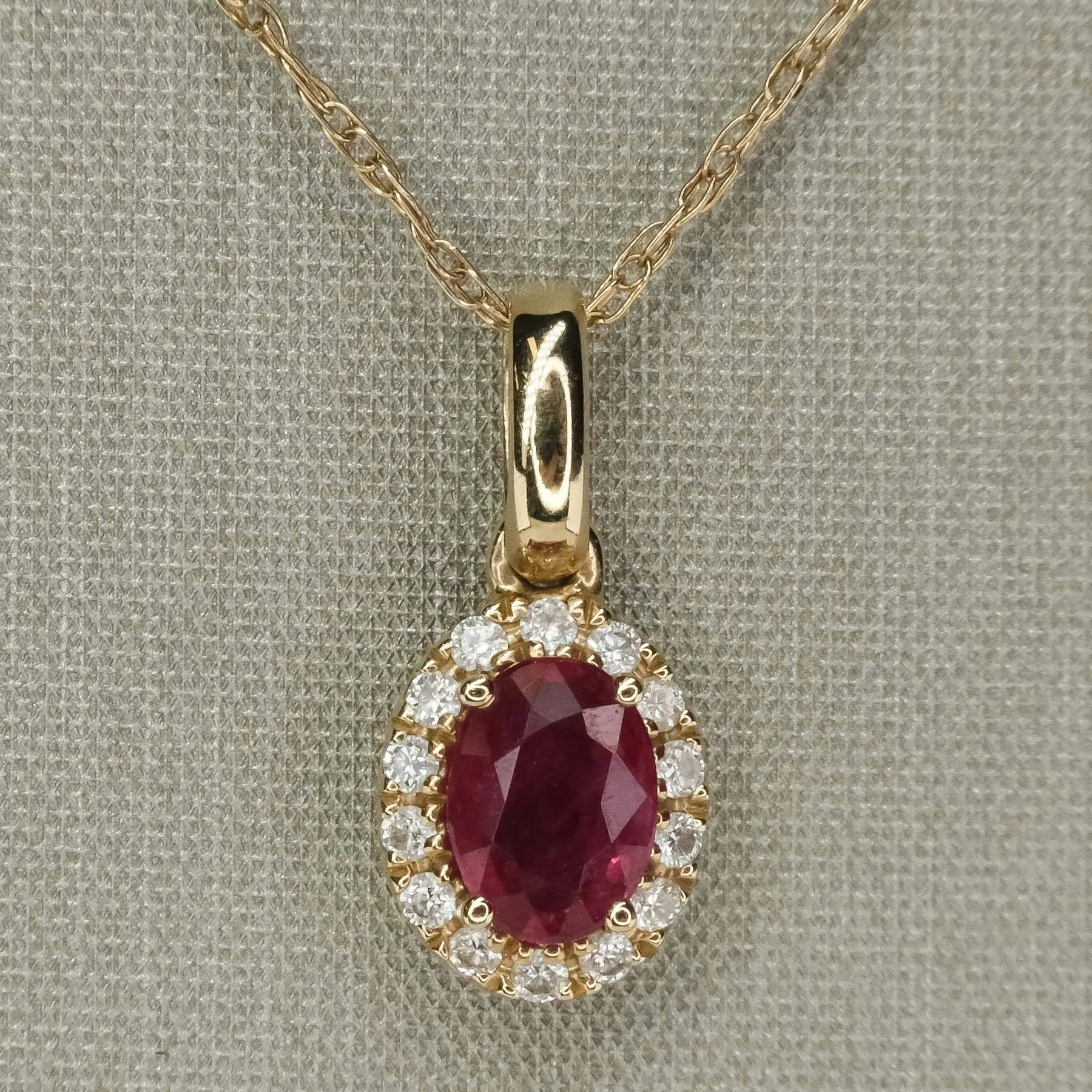 Ruby & Diamond Accented Oval Halo Pendant on 18" Chain Necklace in 10/14K Yellow Gold