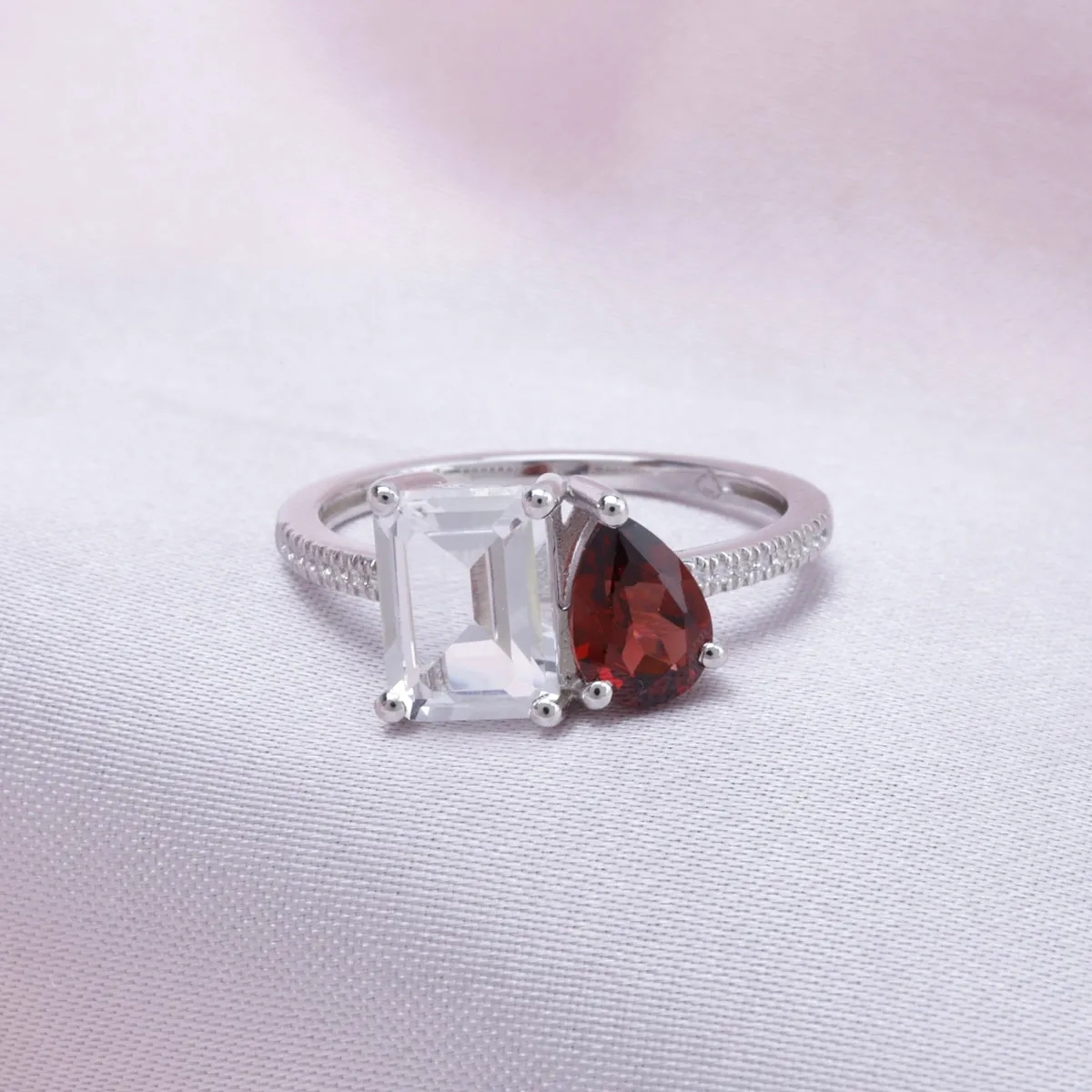 Two-Stone Garnet, White Topaz, and Diamond Ring